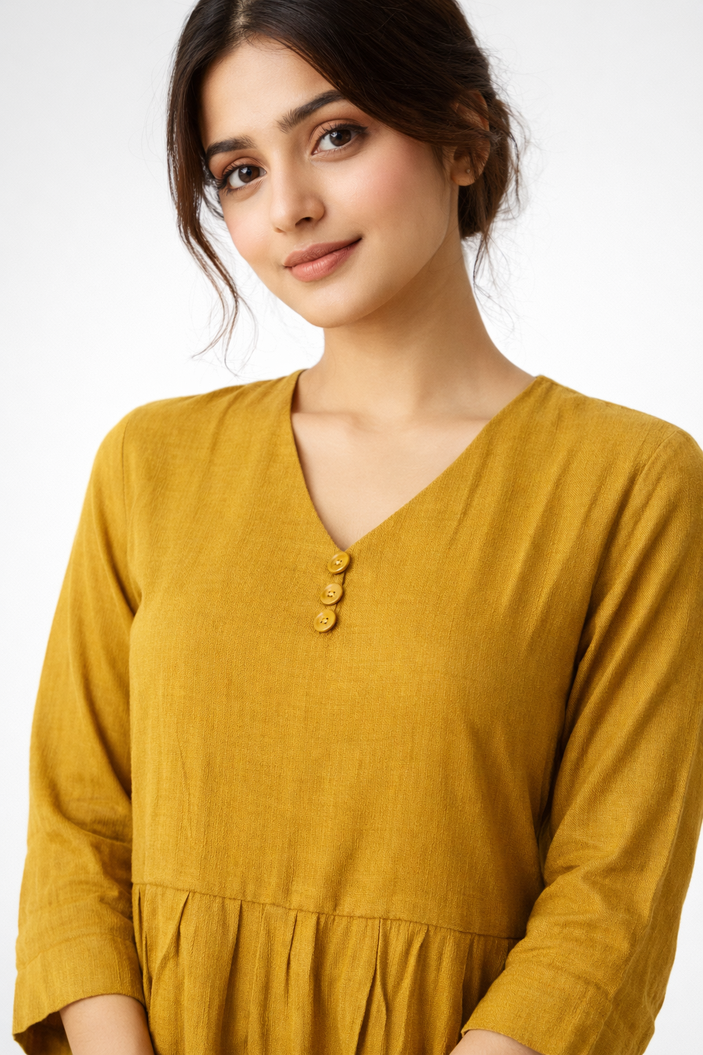 Bright and effortlessly stylish, this mustard yellow dress features a flowy tiered silhouette for a soft, feminine look.