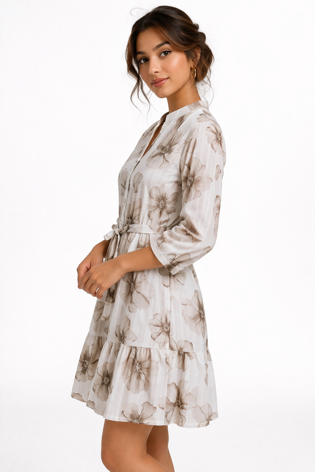 Graceful and feminine, this beige floral dress features a soft flowy silhouette with delicate prints.