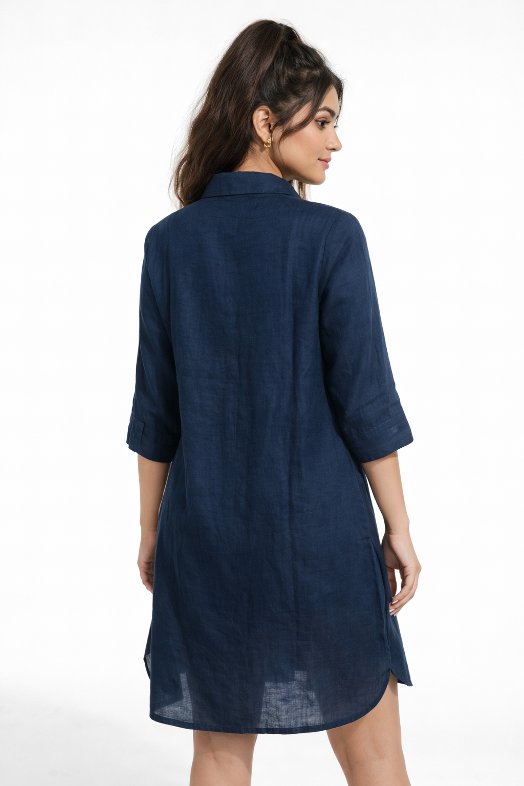 Elegant and effortlessly stylish, this navy blue shirt dress features a sleek silhouette with subtle white floral embroidery for a refined touch.