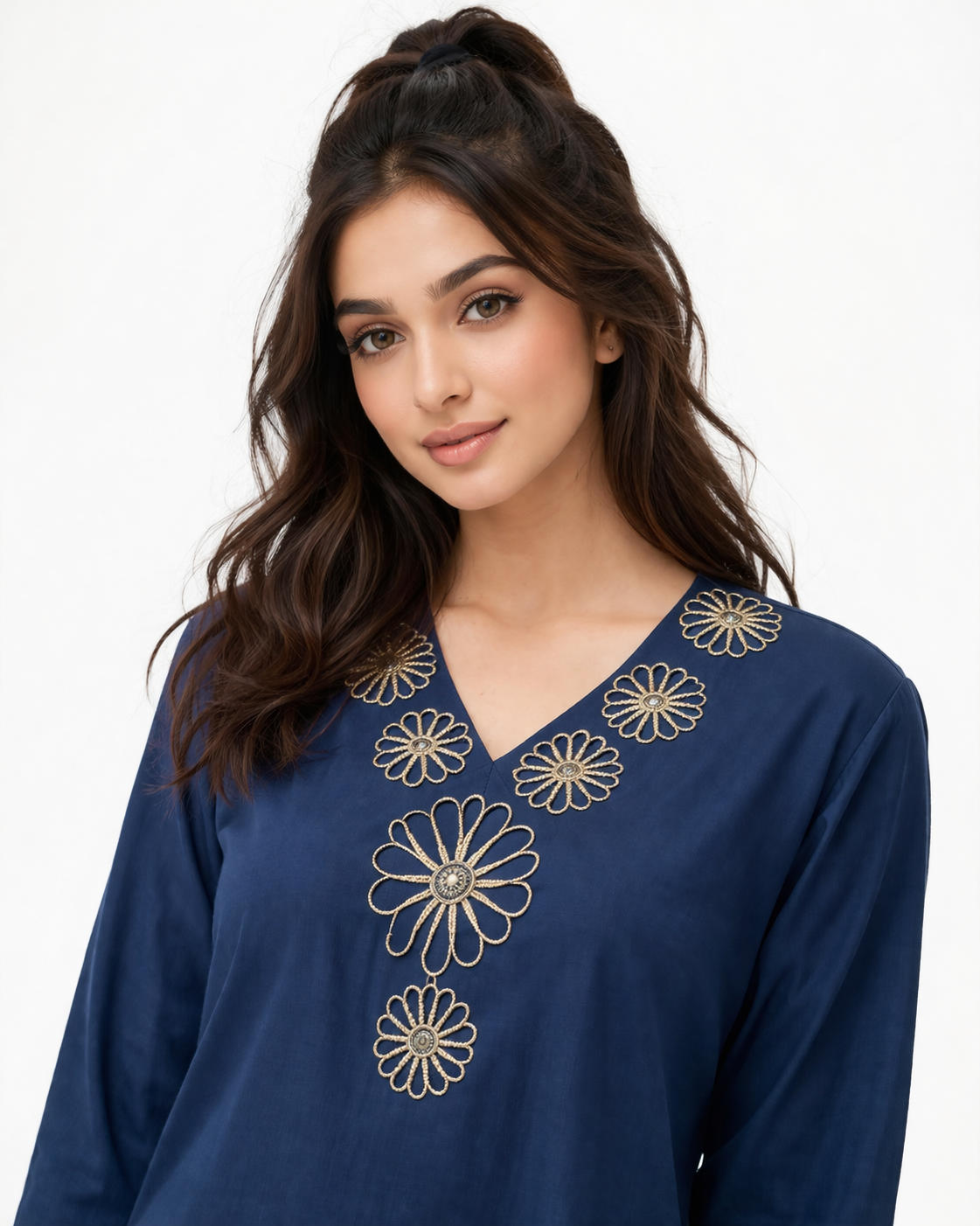 Two-piece co-ord set with intricate cutwork floral embroidery at the neckline and hem.