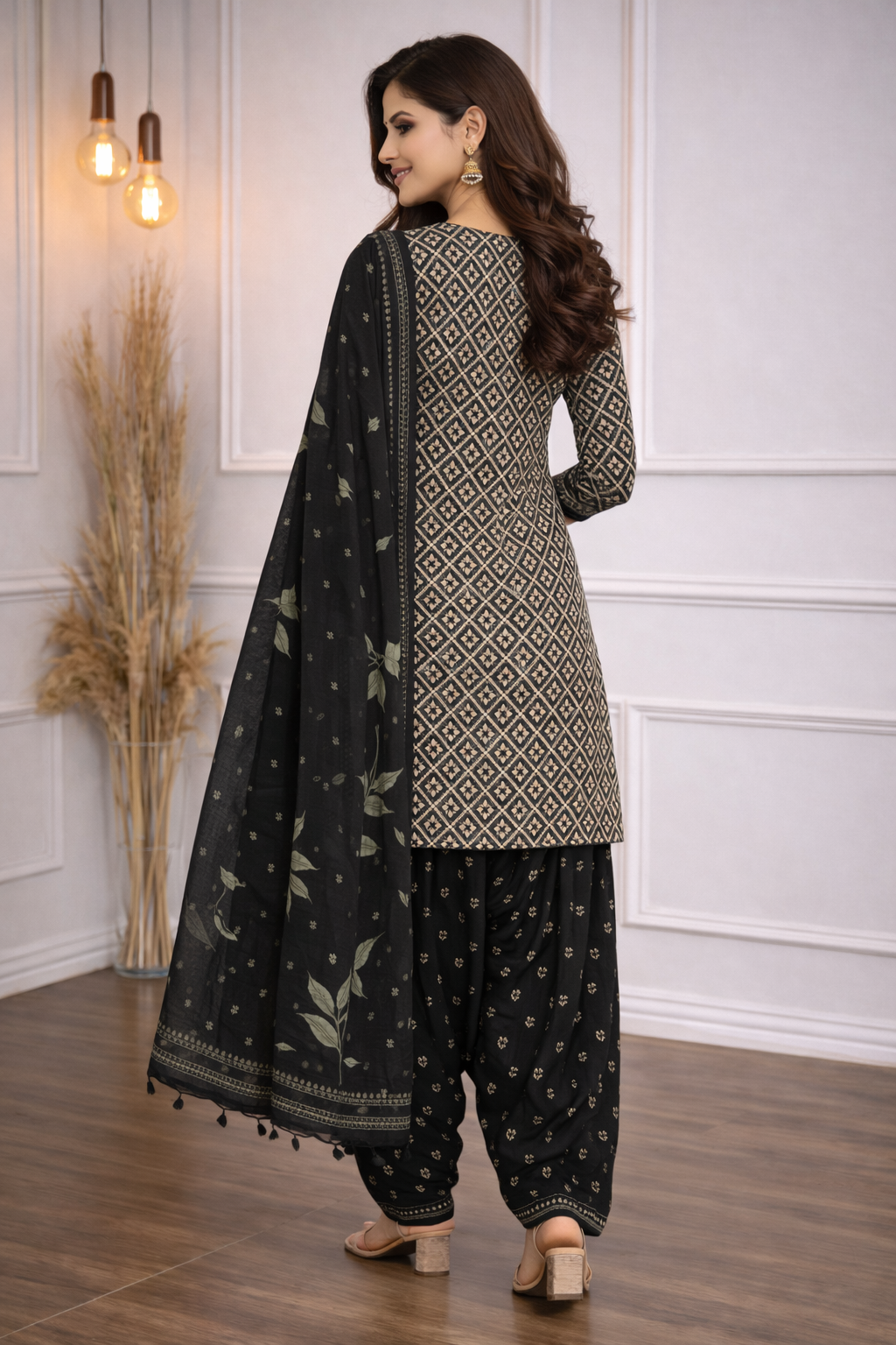 Bottle green ethnic suit set adorned with delicate white intricate ivory geometric prints, paired with a matching dupatta for a fresh and graceful