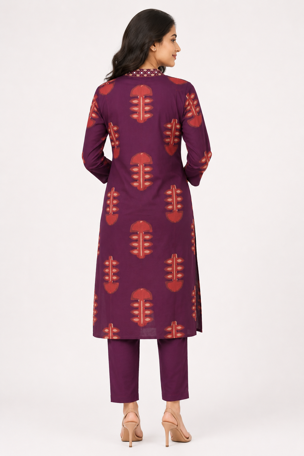 Elegant wine-colored straight kurta pant set featuring an all-over traditional printed design.