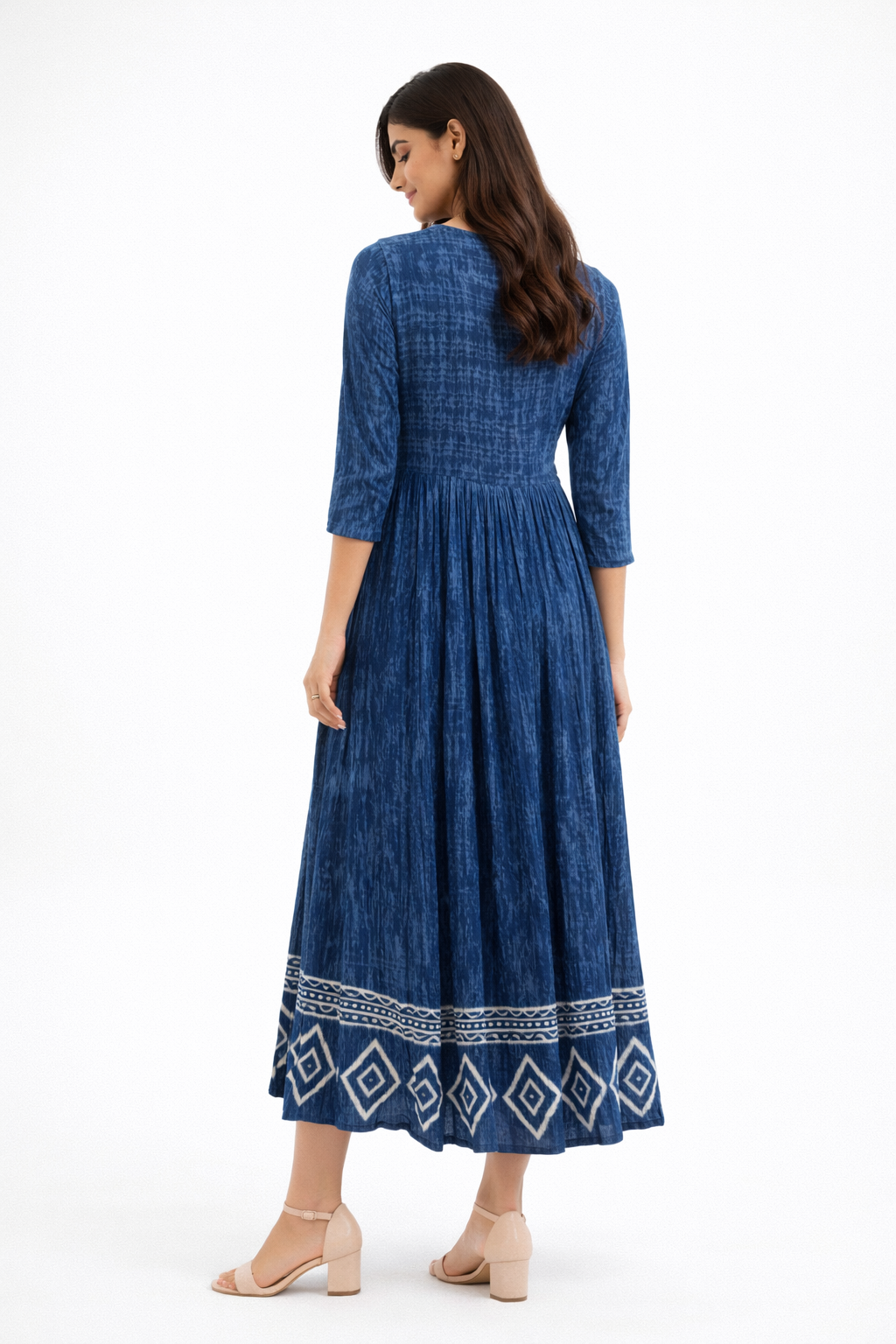 Midi dress featuring a round neckline and long sleeves