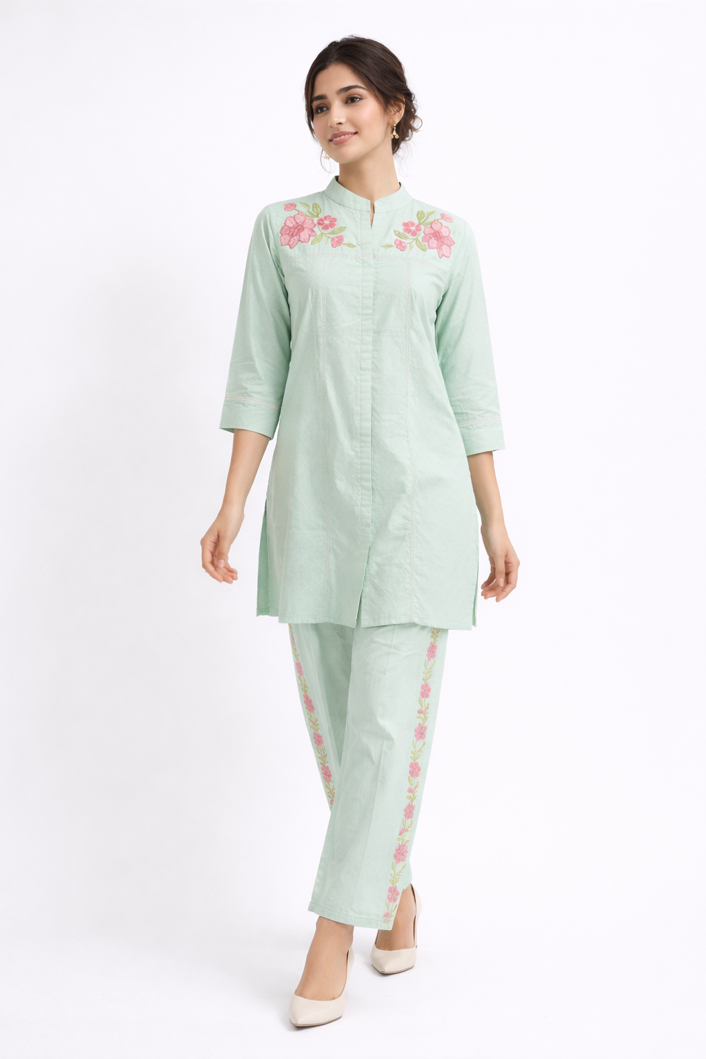 Elegant Mint Green Floral Embroidered Kurta Set.