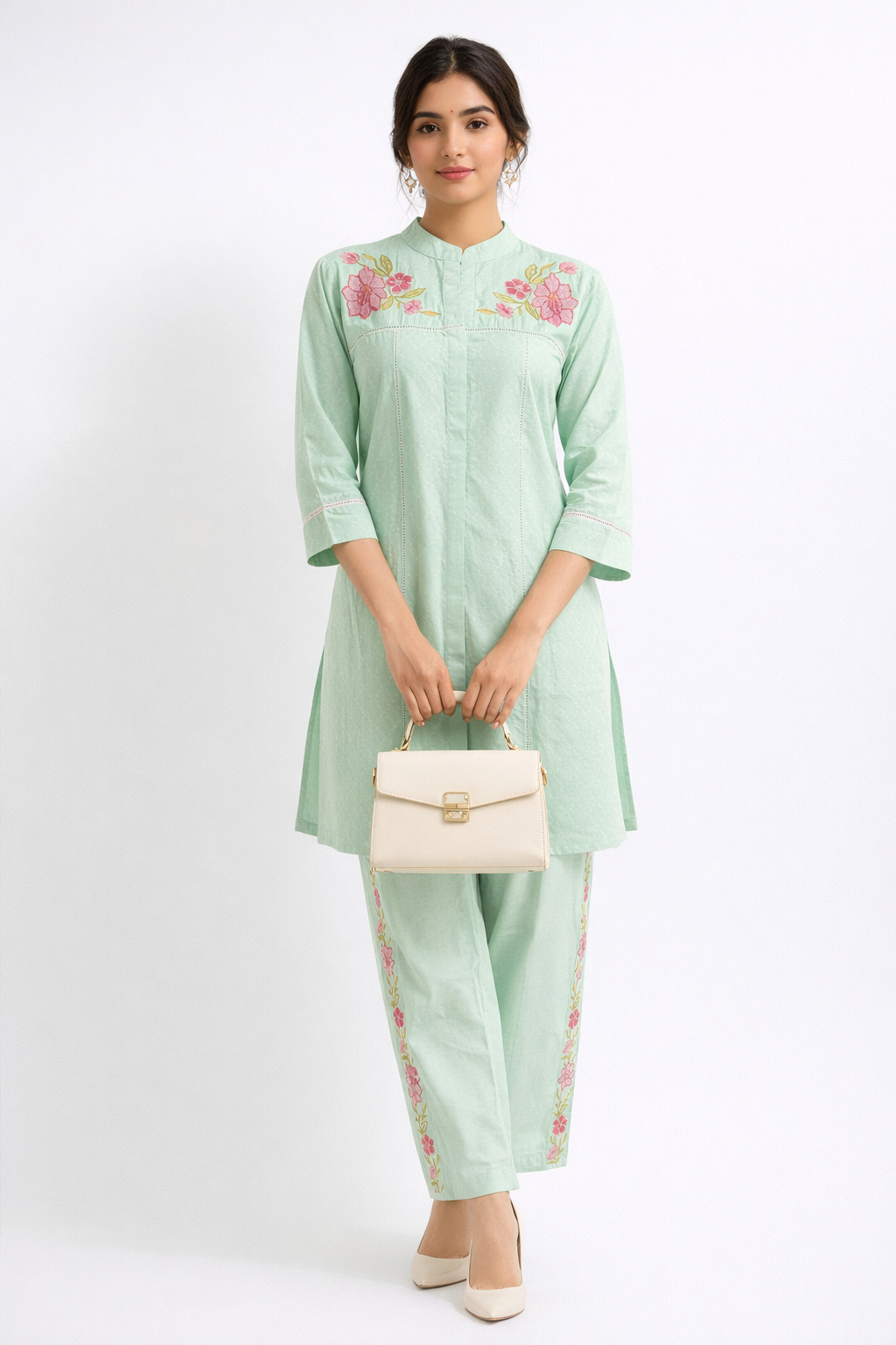 Elegant Mint Green Floral Embroidered Kurta Set.